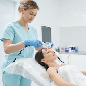 beautician-performing-radiofrequency-facial-treatment 2
